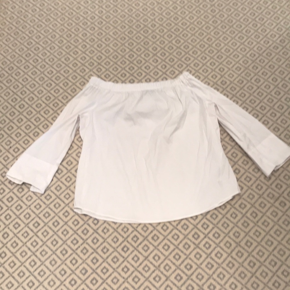 Crisp white off the should top